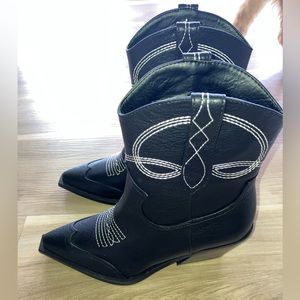 Brand new black cowboy boots!Never worn. So cute!